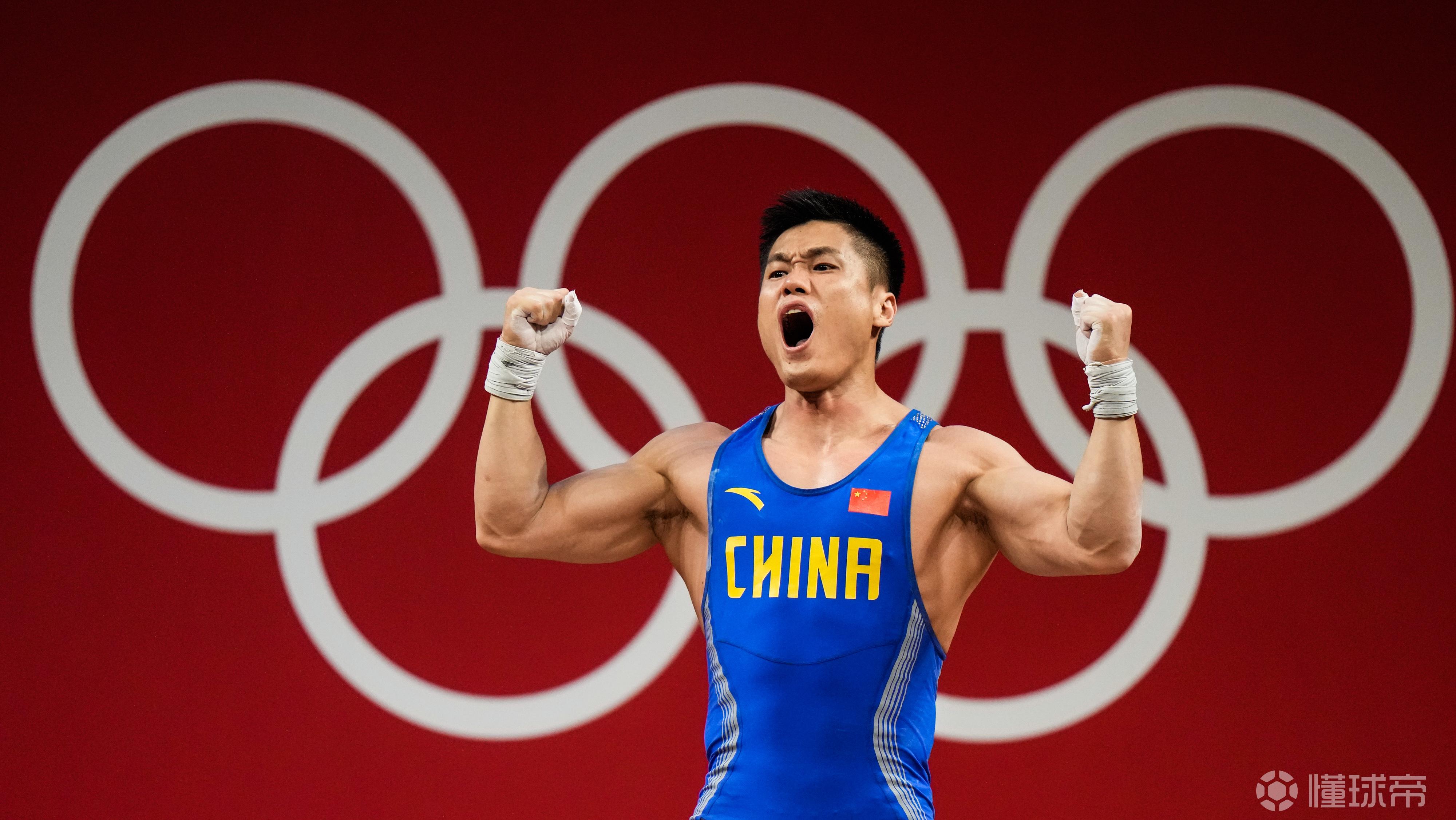 新华社中国举重队东京大捷体现中国力量蕴含中国智慧